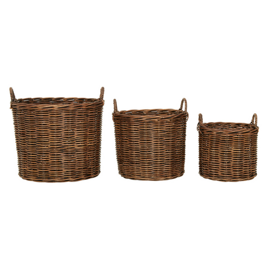 Three natural, brown rattan baskets with handles, sitting in a row on a plain white background